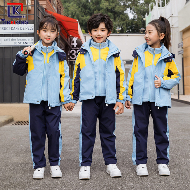Elementary school students' school uniforms thickened cold-proof assault clothes can be removed three-piece kindergarten uniforms autumn and winter windbreaker class clothes