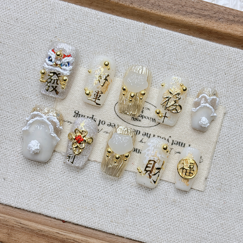 Jade Snow Golden Lion Brings Wealth and Blessings 2026 New Year Edition Purely Handmade Wearable Nails Three-Dimensional Relief National Style Short Almond Nails