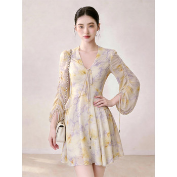 Elegant Dress with V-Neck, Lantern Sleeves, Printed Tie, and a Unique Waist-Cinching Design for Summer 2026