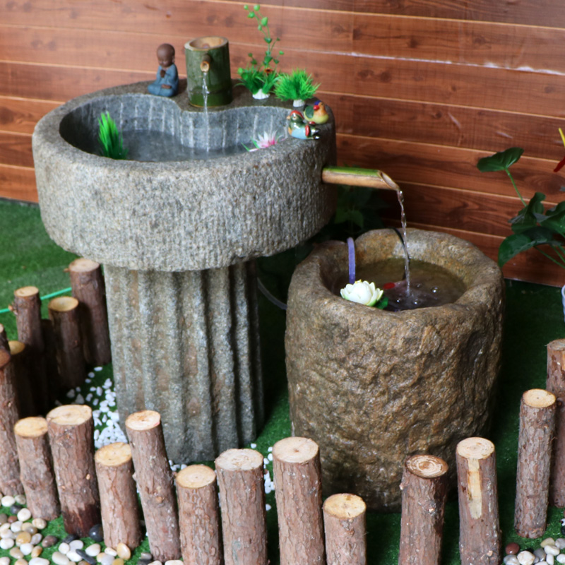 Old stone millstone stone tank stone tank flower pot indoor courtyard stone basin flowing water landscape swing piece of fish pond old sink fish tank