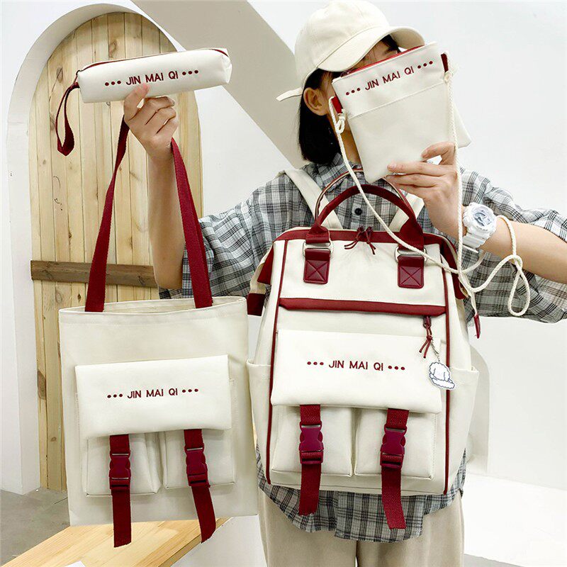 Tide brand four-piece schoolbag female primary school junior high school large-capacity rucksack high school college students all-match backpack