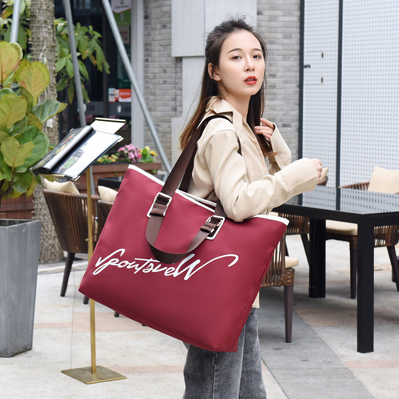 Weihe net red travel bag female portable short-distance luggage bag large-capacity one-shoulder messenger travel bag tide fitness bag male