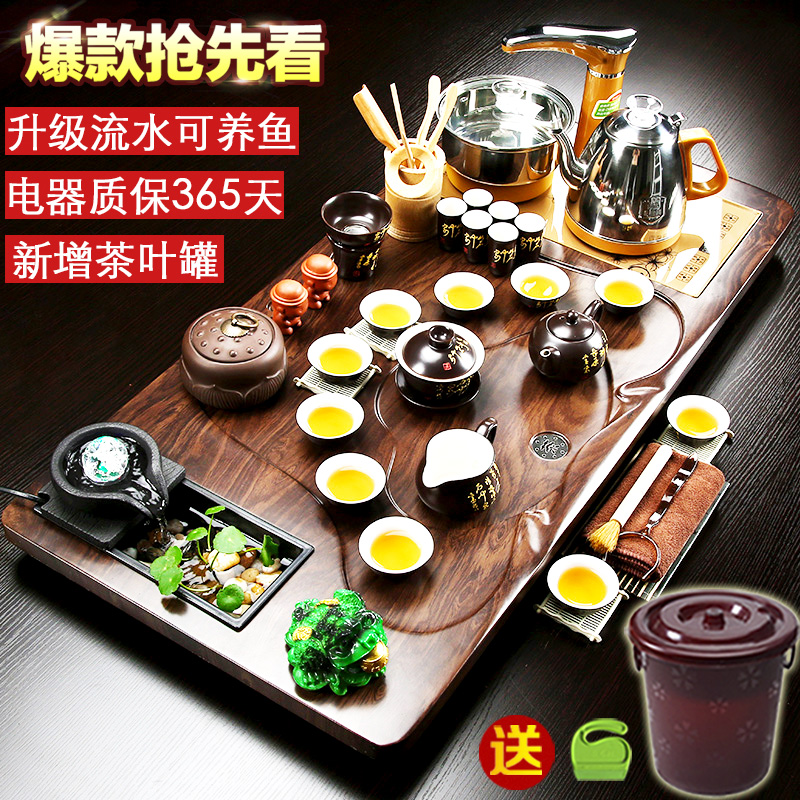 A complete set of Kung Fu tea sets, household simple automatic induction cooker, one piece of solid wood tea tray, tea table, tea sea