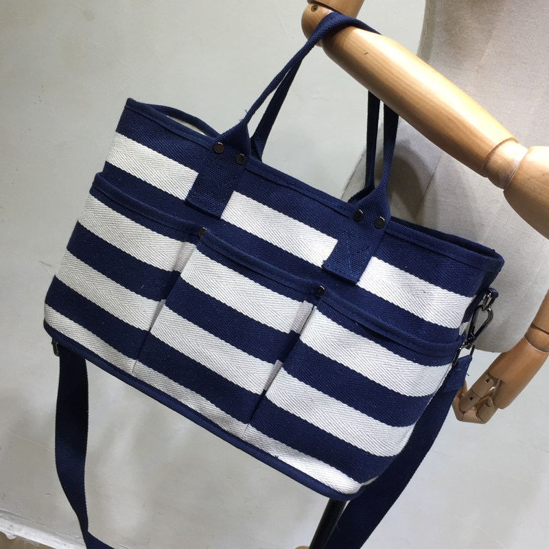 2022 new Japanese and Korean trendy hot mom striped portable one-shoulder messenger bag female multi-functional large-capacity waterproof mommy bag