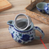 Bộ ấm trà bằng gốm với ấm trà cổ điển phong lan nhỏ nồi nồi gia đình sức khỏe trà ngoài trời có bộ lọc bình lọc trà Trà sứ