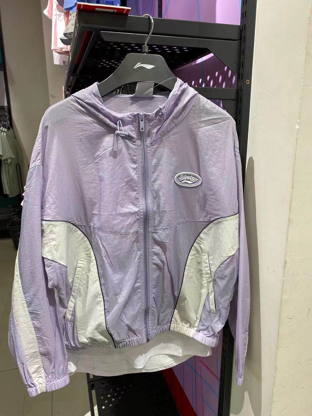 Li Ning woman 2021 fall new wind clothes cardiovert loose blouse sport suit with cap jacket AFDR768