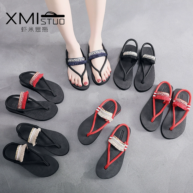 Nữ mặc ngoài flip-flops 2020 dép mùa hè mới nữ ròng gió cổ tích màu đỏ phẳng khu nghỉ mát bên bờ biển dép 