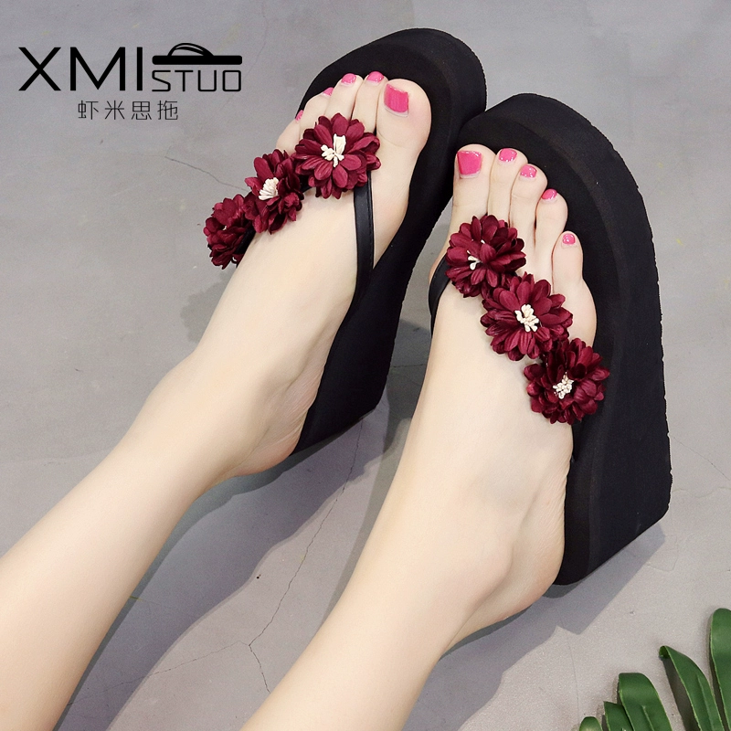 Dép đi trong nhà mùa hè nữ thời trang bãi biển mặc ngoài flip-flops hoa dày lớp vỏ bánh nướng xốp với dép lật chống sạt lở cao gót 