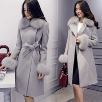 Mùa thu đông 2018 phiên bản mới của Hàn Quốc tự dưỡng dày lên ấm áp áo cổ lông lớn bằng len có thắt lưng là áo khoác len nữ mỏng áo vest dạ nữ