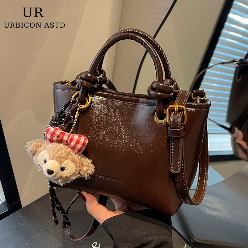 Высококачественная взрывоопасная сумка женская 2025 новая осенне-зимняя супер-пожарная универсальная сумка-мессенджер легкая роскошная нишевая портативная сумка-ведро