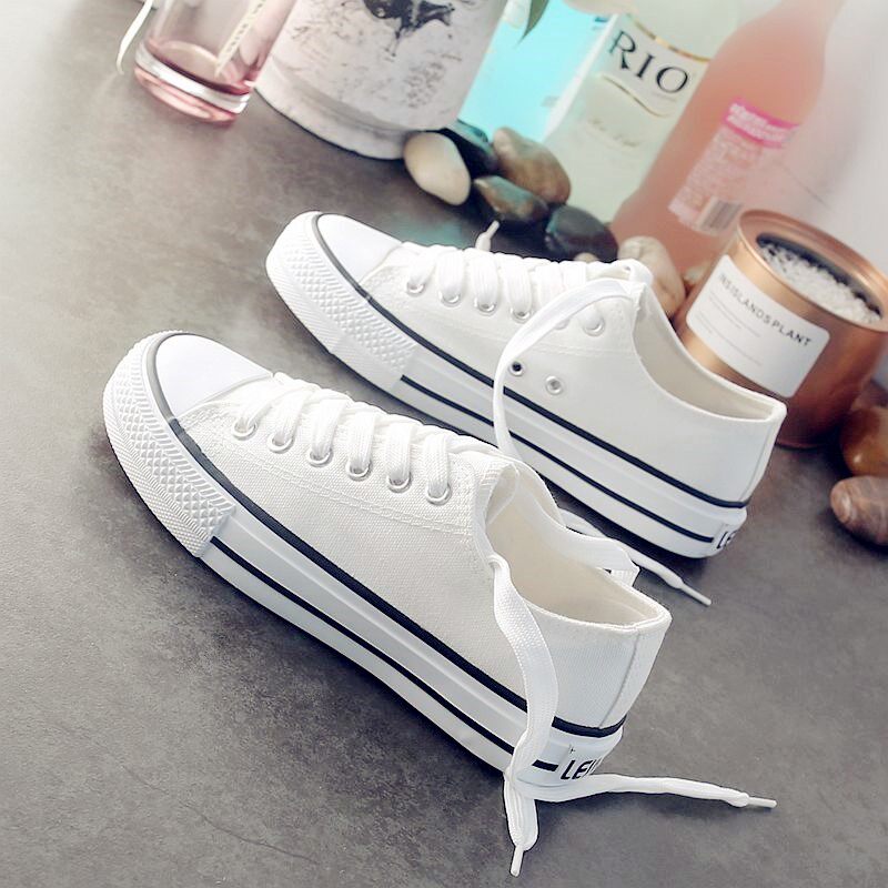 Hong Kong 2021 new small white canvas woman shoes low Help flat bottom plate Shoe Han version 100 hitch student high cylinder cloth shoes