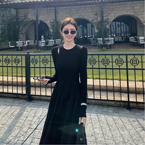 Japanese black long sleeve knitted dress female autumn and winter design temperament to wear loose and thin shoulder with long dress