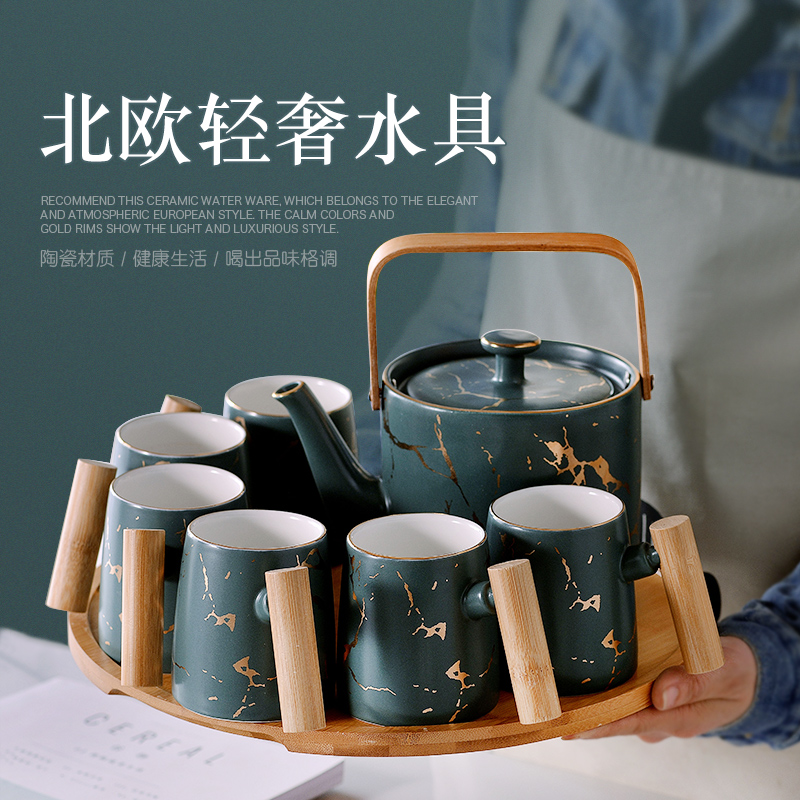 . Poly real scene of jingdezhen ceramic cups tea suit household pure manual high - end north European office in the teapot