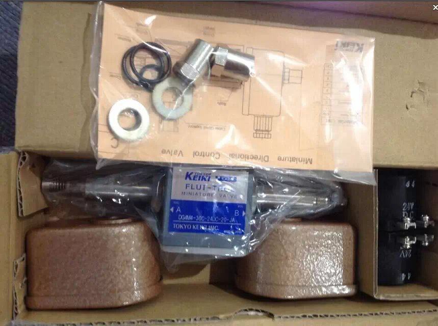 Japan TOKYO KEIKI TOKIMEC SOLENOID VALVE DG4M4-32C-24DC-20-JA Xu