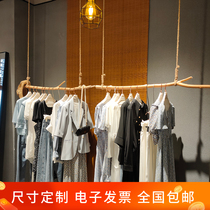 Peel and polished shape small tree trunk high-end clothing display display rack decoration Zhongdao frame custom solid wood clothing shelf