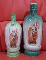 Ceramic Wine Bottle Collection 1444 Early on a pair of wine bottles