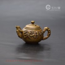 Antique copper carving on bronze carving bronze cup on a small teapot in brass hands pieces of bronze bronze fine carved copper