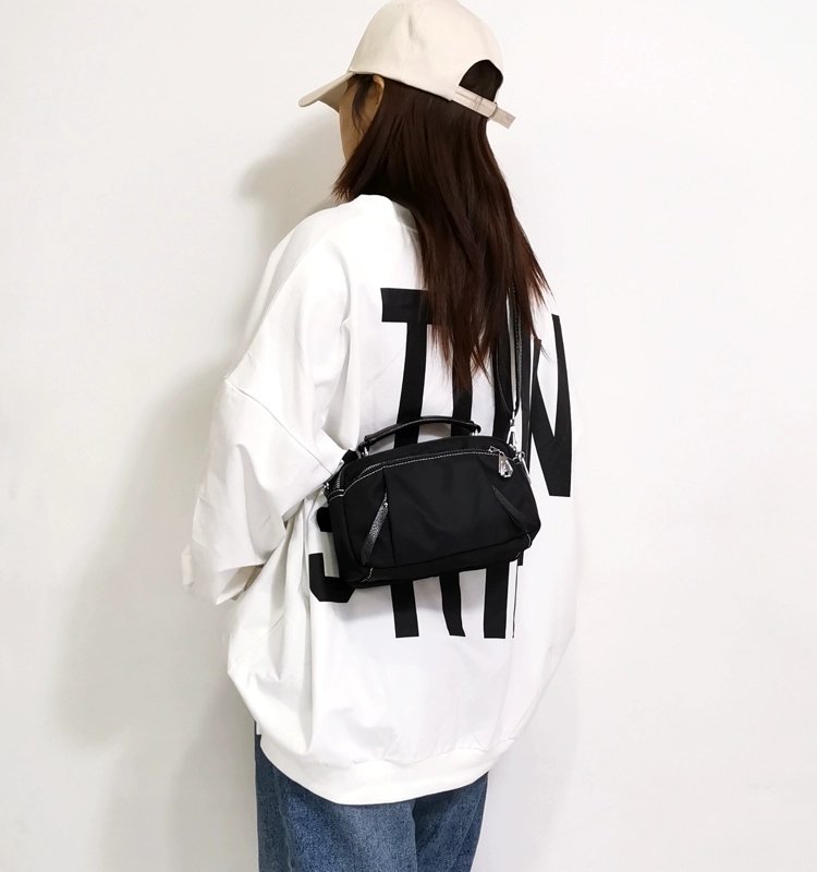 Túi xách nữ 2020 mới thời trang Hàn Quốc Boston túi xách nylon hoang dã vai messenger túi màu đen - Túi xách nữ