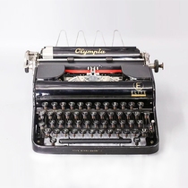 German OLYMPIA OLYMPIA vintage machinery English German typewriter can be typed Vintage Antique collection