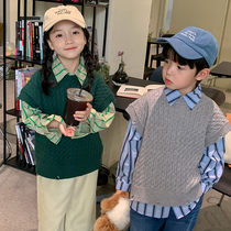 Childrens spring and autumn Korean version knitted sweater 2022 new boys and girls solid color casual hole round neck vest sweater