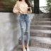 Quần 2018 mới thời trang Hàn Quốc cao eo thun thun jeans nữ chân retro Hồng Kông hương chín quần Quần jean