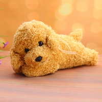 Светло -коричневая плюшевая собака