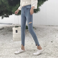 Hồng Kông hương vị sang trọng eo cao bó sát quần thun lỗ quần jeans của phụ nữ hoang dã không thường xuyên chân bàn chân quần bút chì thủy triều quần bò nữ