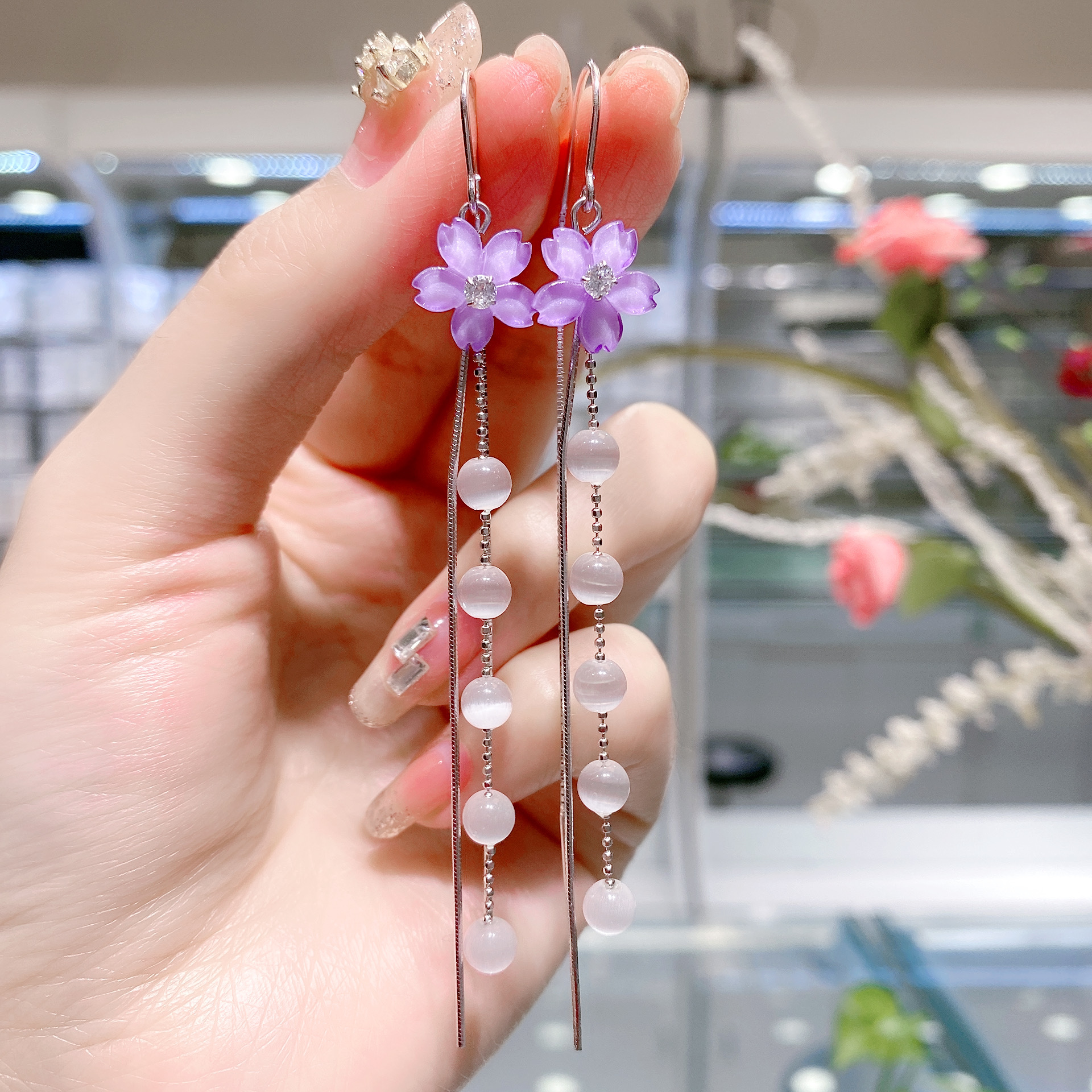 In 2021, new tide pure silver tide purple crystal flower earrings of long - plate cat eye flower to prevent the ear chain