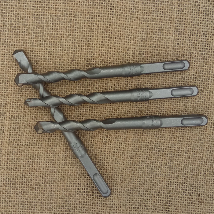 Square head drill bit square handle cement drill bit electric hammer drill percussion drill head mixed earth drill bit 6 * 140-25 * 350mm