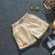 Mùa hè nam cotton ba quần bốn quần Quần Slim Hàn Quốc thể thao quần short nhà 3 quần 4 quần thủy triều