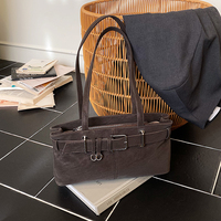 High-end armpit bag for women 2025 new Korean retro niche portable shoulder bag belt decorated baguette bag