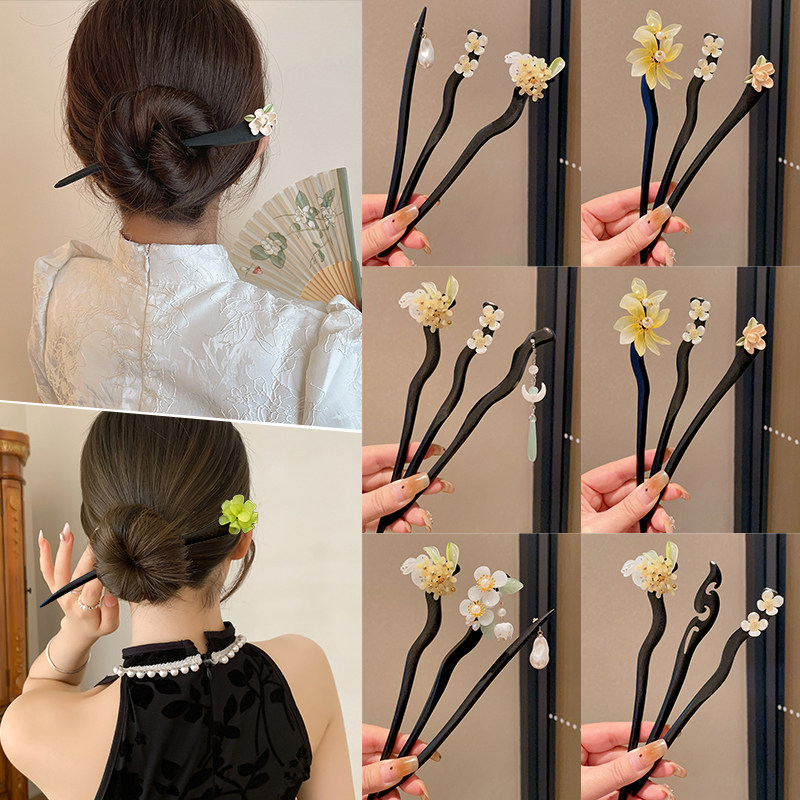 高級な黒檀のタッセル付きヘアピン。女性向けの新しい中国風ヘアピンで、アップスタイルやヘアピンに最適です。2026年の新デザイン。