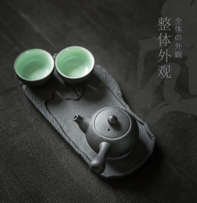 British green side between ink pot of Japanese kung fu tea set ceramic teapot set with a pot of tea tray two cups