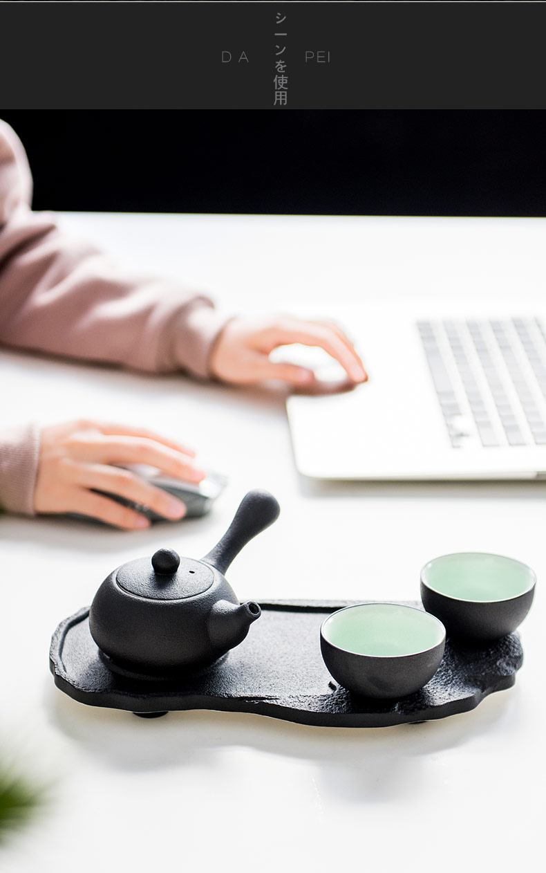 British green side between ink pot of Japanese kung fu tea set ceramic teapot set with a pot of tea tray two cups