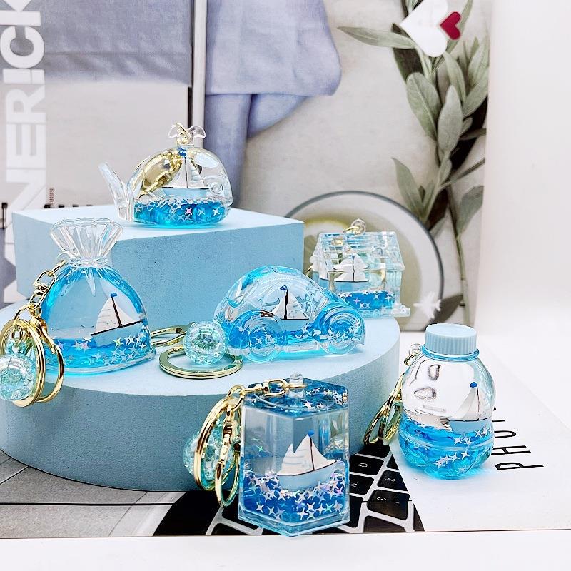 Oil-Filled Ocean Sailing Boat Floating Bottle Keychain Exquisite Children's Backpack Pendant Car Key Chain Ring Couple Pendant