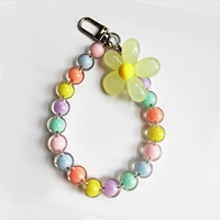 Бусины желтого цвета в виде цветов 1 шт.