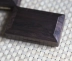 Hạc đen nhạc cụ lê gỗ / gỗ gụ hộp phụ kiện hộp lau sậy Capo guitar classic Phụ kiện nhạc cụ