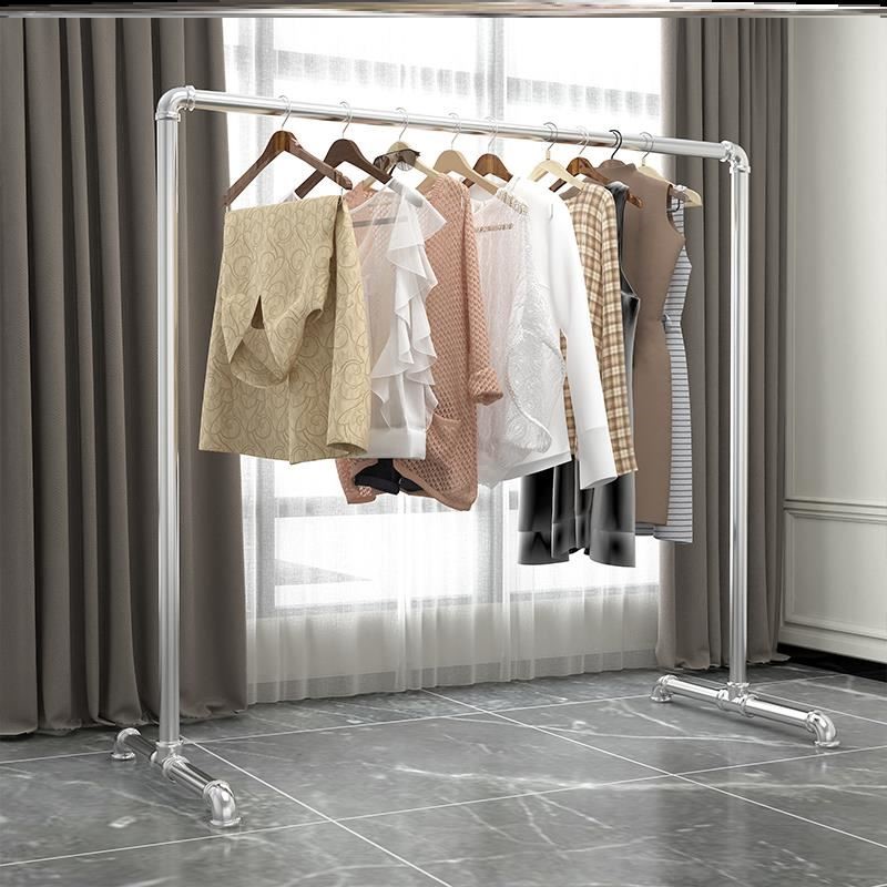 Dry drying of sausage rack with raw meat hanging drying down clothes hanging clothes sun-covered rooftop children hanging clothes