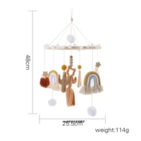 Радужная игрушка на кроватку