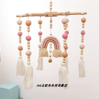 Радужная розовая игрушка на кроватку