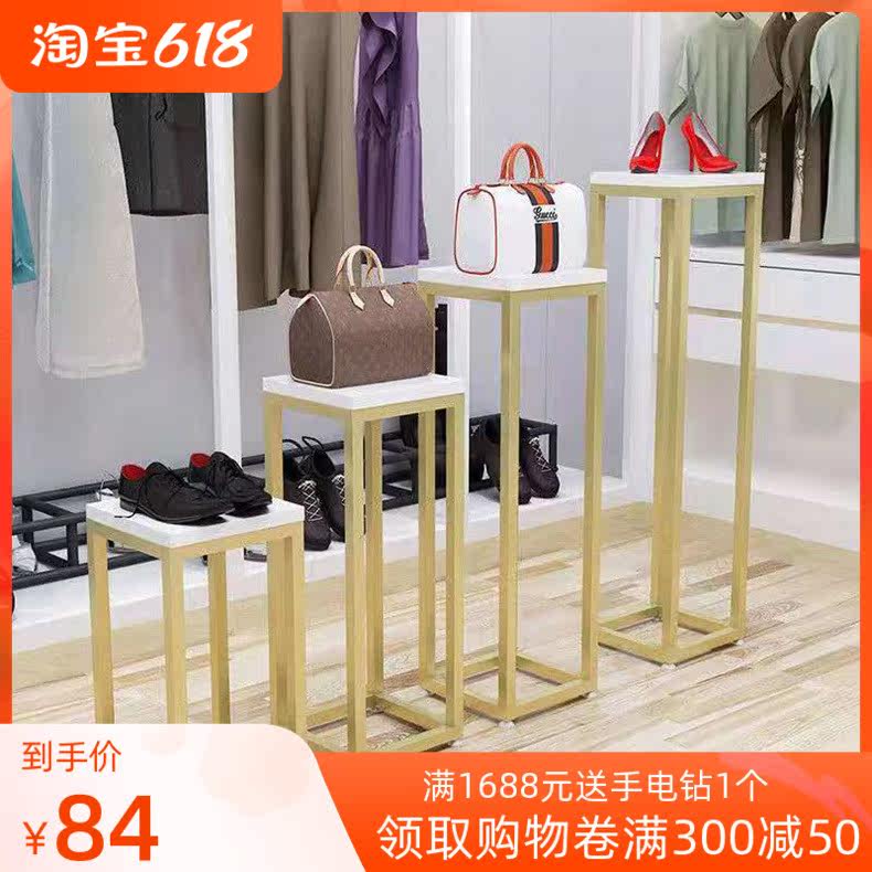 Florist's hand holding flower stand multi-meat green planting high and low flowing water table table window iron art flower pot shelf display shelf