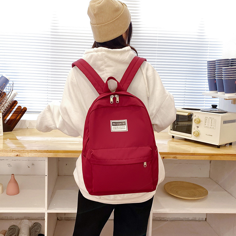 Custom LOGO backpack travel group building performance solid color backpack student institution training school bag embroidery printing