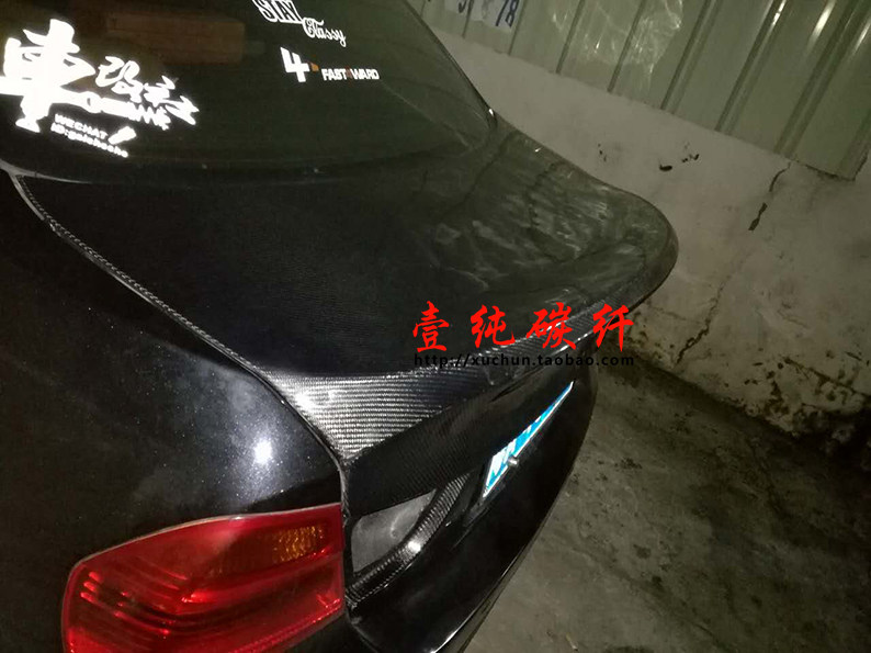 Suitable for 06-08BMW3 series E90 carbon fiber tail lid 09~11 modified rear upturned CSL trunk