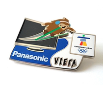 2010 Vancouver Winter Olympics badge sponsor Panasonic TV mascot ski badge rare