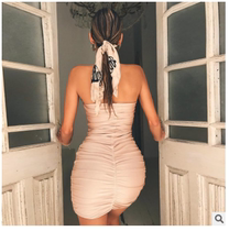 2018 European and American spring and summer new chest-wrapped pleated wrap dress solid color off-the-shoulder thin hip short skirt