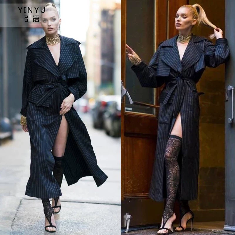 Black trench coat, fitted brace, jacket, mid-length, city style, British style