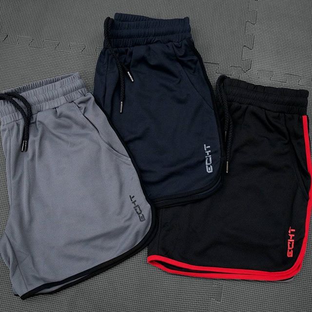 New fitness muscle brothers thể thao quần short chạy nhanh khô quần mùa hè phần mỏng đào tạo ba quần lỏng lẻo quần tập gym