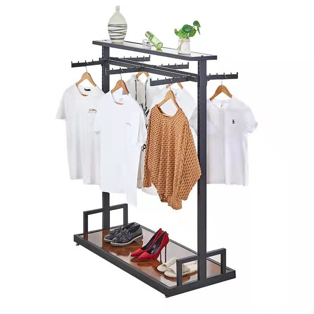 ຮ້ານຂາຍເສື້ອຜ້າສະແດງ rack ຊັ້ນວາງຫ້ອຍຂອງຜູ້ຊາຍແລະແມ່ຍິງ shelves ທາດເຫຼັກເກາະ rack ຄຸນນະພາບສູງສອງດ້ານ