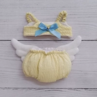 Лимонная желтая одежда в одиночестве без кукол