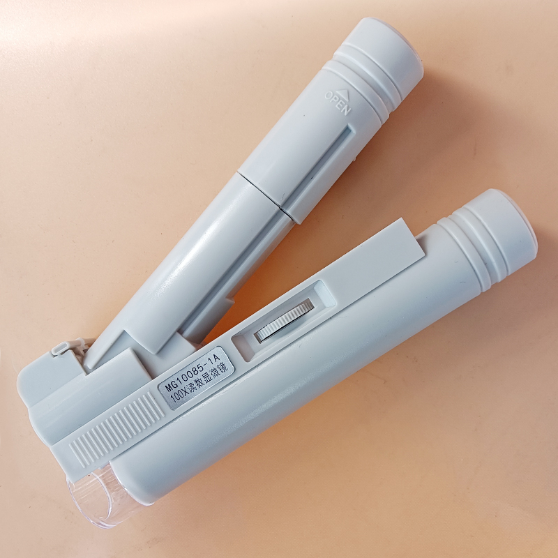 Portable with a 100 - fold reading microscope with light source magnified 100X scale accurately identifying character printing network